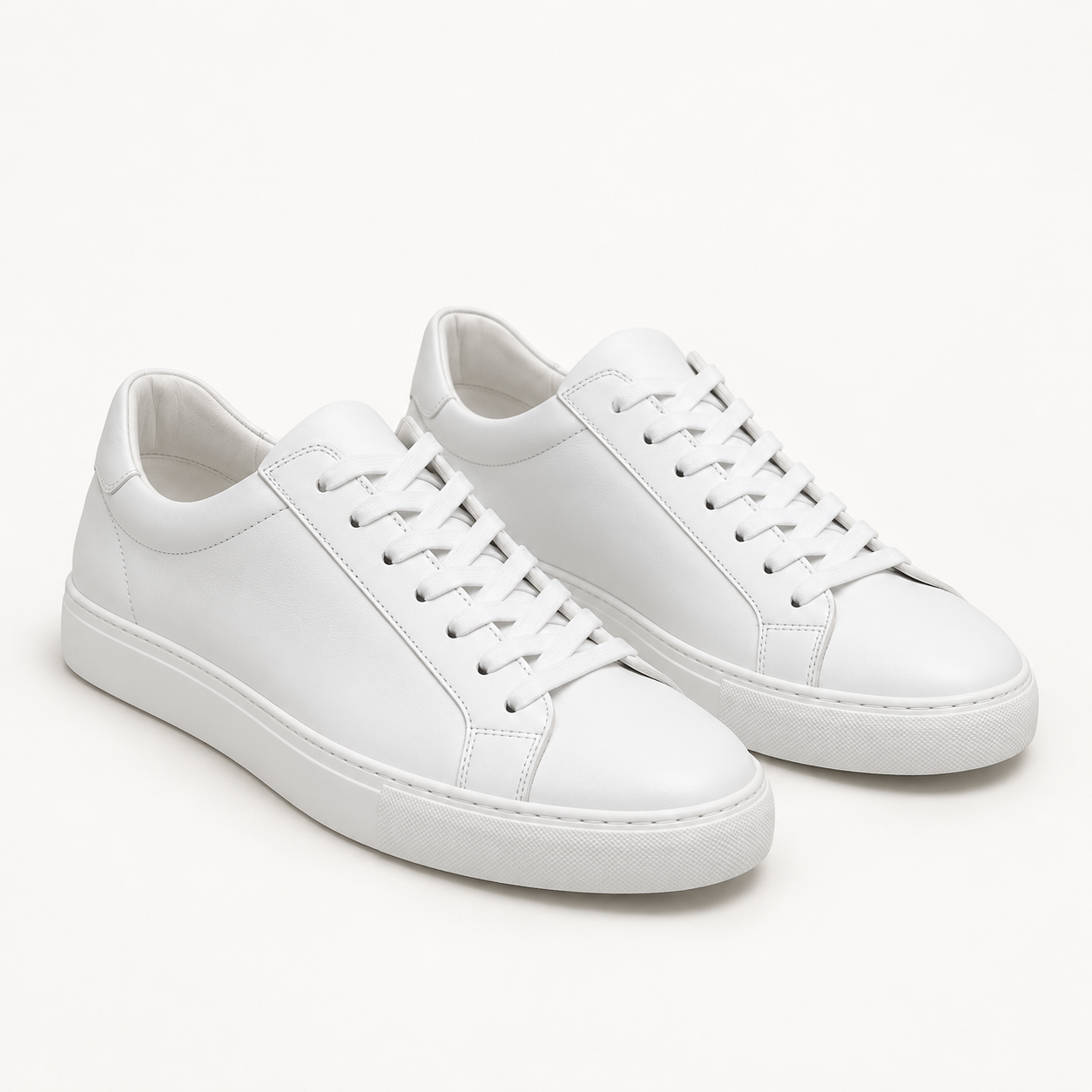 White low-top trainers